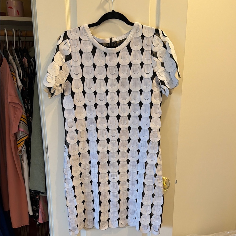 Black Mini Dress with White Circular Appliqué Detail